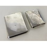 A heavy silver curved cigarette case together with