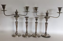 A good pair of Georgian candelabra with fluted tap