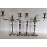 A good pair of Georgian candelabra with fluted tap