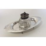 A small silver Adams' style inkstand with hinged t