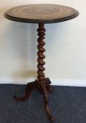 A late Georgian pedestal wine table with barley tw