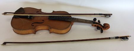 A cased violin and two bows. Marked, "Hopf". Est.