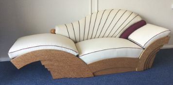 POLTRONOVA: A massive maple veneered day bed of st