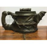 An unusual small simulated bamboo pottery teapot.