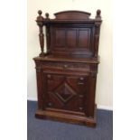 A Continental oak sideboard with panelled back, sh