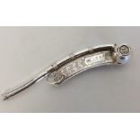 A Victorian silver bosun's whistle with bright cut