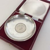 A heavy silver pin dish inset with a Churchill cro