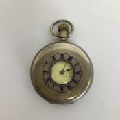 A silver half Hunter pocket watch with white ename