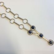 A good stylish silver and lapis necklace with ring
