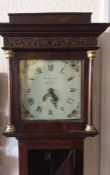 A small oak cased grandfather clock with plank fro