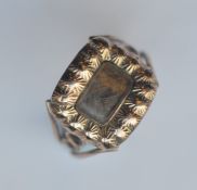 An Antique hair decorated mourning ring with wrigg