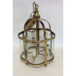 An unusual brass mounted quartrefoil shaped ceilin