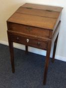 An Antique fruit wood desk with single drawer and