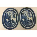 A pair of blue and white oval pearlware plates dec