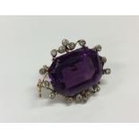 An attractive Victorian amethyst and diamond brooc