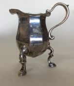 A good quality heavy cast silver cream jug with sc