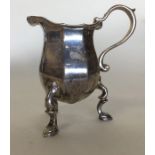 A good quality heavy cast silver cream jug with sc