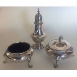 A good quality silver three piece cruet set on hoo