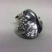 An unusual silver mounted paperweight in the form