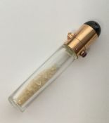 An unusual gold mounted scent bottle with hinged t