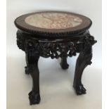 A small Chinese mahogany jardiniere stand with mar
