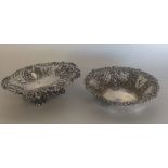Two silver embossed bonbon dishes heavily decorate