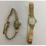 A lady's gold Tissot Quartz wristwatch on mesh str