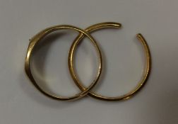 Two 18 carat gold rings. Approx. 7 grams. Est. £80