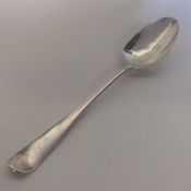 A Georgian Hanoverian rat tail silver tablespoon.