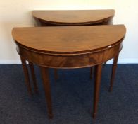 A good pair of George III mahogany tea tables, the