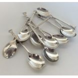A good set of ten silver nail top coffee spoons. L