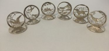 An attractive set of six silver menu holders depic