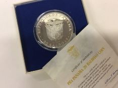 A large 1974 silver Panama 20 Balboas coin. Est. £