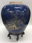 A large blue ground Chinese vase decorated with ho