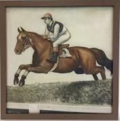 A framed perspex sign depicting a jockey on a race