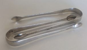 Two pairs of Georgian silver sugar tongs. Approx.