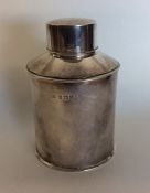 A good silver cylindrical tea caddy with lift-off