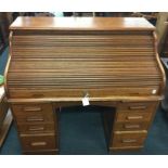 A good oak twin pedestal roll top desk. Est. £150