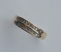 A modern 9 carat two row ring. Approx. 4 grams. Es