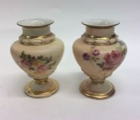 An attractive pair of Royal Worcester vases decora