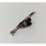 A good quality cabochon garnet and rose diamond br