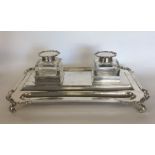 A massive silver desk inkstand, the square glass b