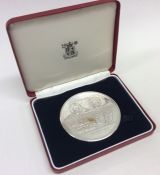A heavy silver Royal Mint medallion entitled "In T