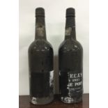 Two x 75cl bottles of Fonseca's Finest 1977 Vintage Port. (Labels indistinct
