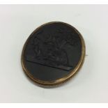 A large oval Wedgwood cameo in gold frame with loc