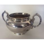 A Victorian helmet shaped silver cream jug with gi