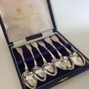 Six heavy silver fiddle pattern teaspoons containe
