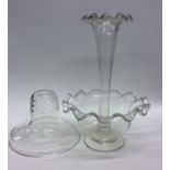 A small glass epergne with wavy edge together with