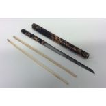 An unusual Asian chopstick and knife set in tortoi