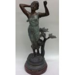 A large spelter figure of a lady in standing posit